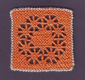 Example of Puncetto needlelace.