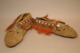 A pair of moccasins from the Northeast Indians (?) decorated with glass beads and moose hair tassels, 1860s.
