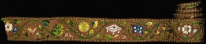 An embroidered ribbon, silk, England, c. 1700.