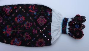 Detail of cotton blouse from Romania, embroidered with cross stitch, 1950s-1960s.