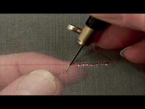 The process of tambour beading.