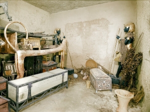 One of the rooms of Tutankhamun's tomb, before the archaeological clearance. Much ancient embroidery was found in the tomb of this 14th century BC Egyptian pharaoh.