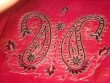 Example of ari embroidery.