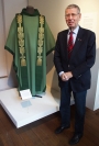Ben Stadelmaier poses in front of his firm's creations, the Nijmeegs model, with outside stole.