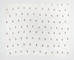 Indian shawl, in cotton, with embroidered sprigs of flowers. India, late 18th century.