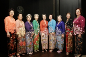 Photograph showing a group of women wearing traditional Peranakan (nonya) kebaya's