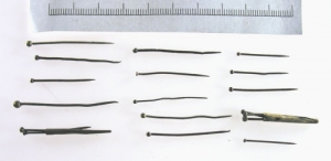 Medieval copper alloy wire-wound pins with globular shaped heads. England.