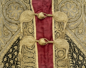 Fastenings of a gold-embroidered choga from the northwest of the Indian subcontinent. Mid-19th century.