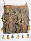 Aum&ocirc;ni&egrave;re from France, dated c. 1340, 15.8 x 14.5 cm, made of linen with silk and gold thread embroidery.