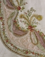 Fragment of a late 18th century French court mantua-style dress. It is made of mbroidered silk satin, with silks, velvet appliqu&eacute;, chenille, metal purl and swansdown.