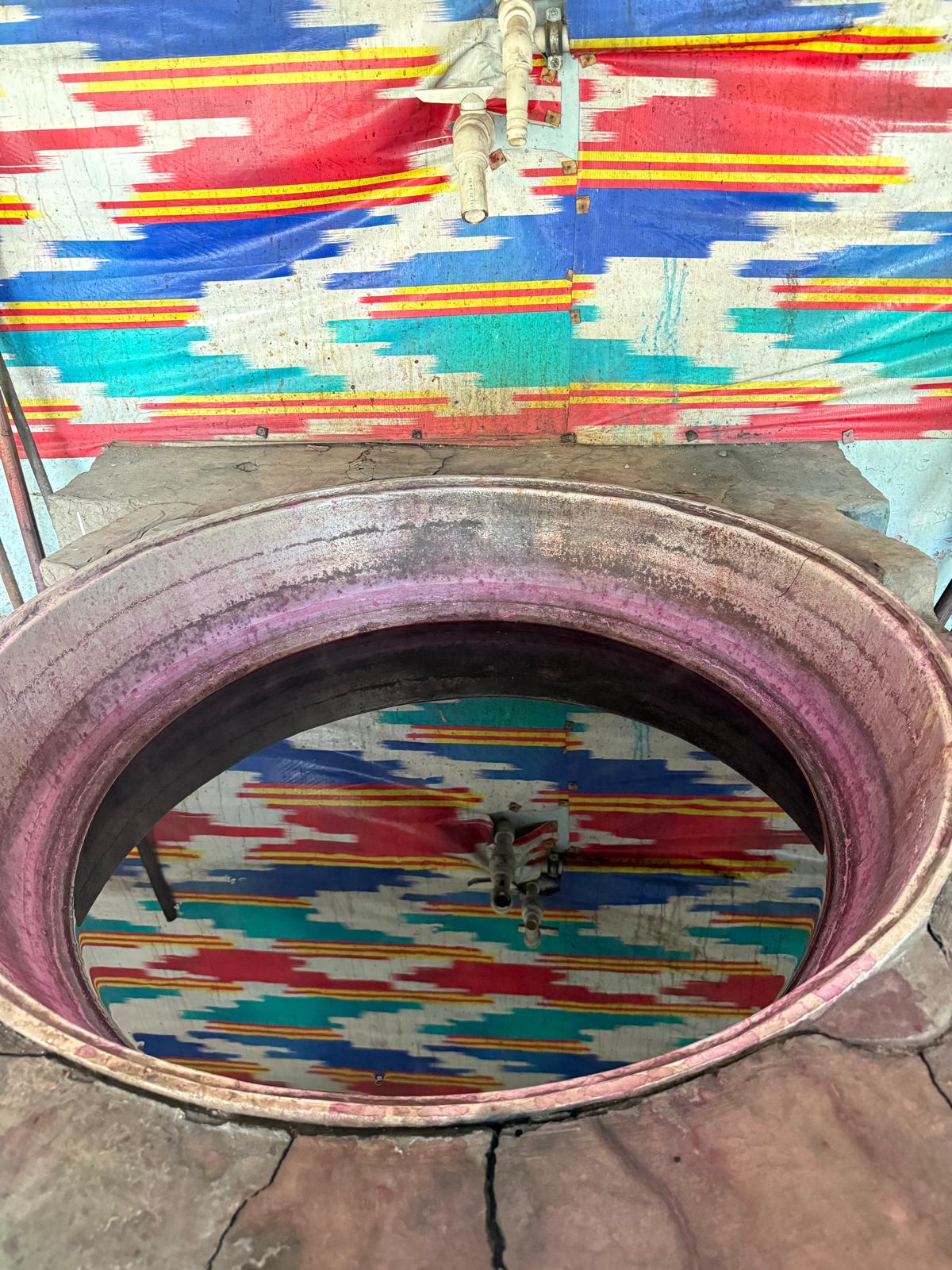 Dying vat with cochineal. Photograph by author.