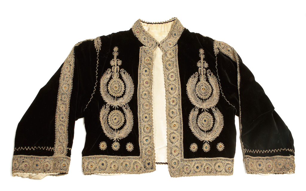 Some military embroidery on show at the Hand & Lock exhibition. The jacket to the right is the TRC's Bethlehem jacket from Palestine, based on a British military uniform. It dates to the 1920s.