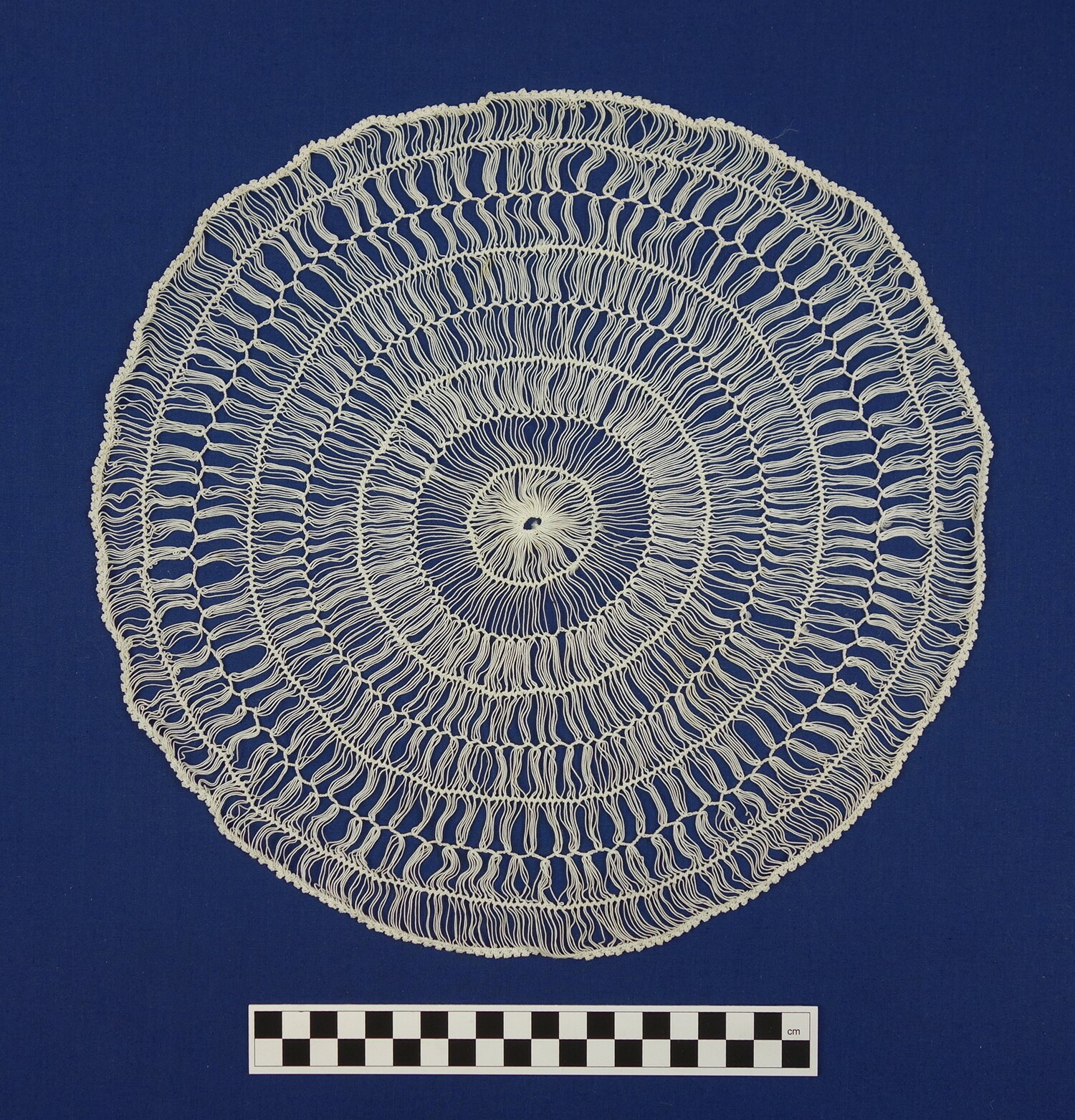 Round doily made in hairpin lace technique. Europe, 20th century (TRC 2016.2428).