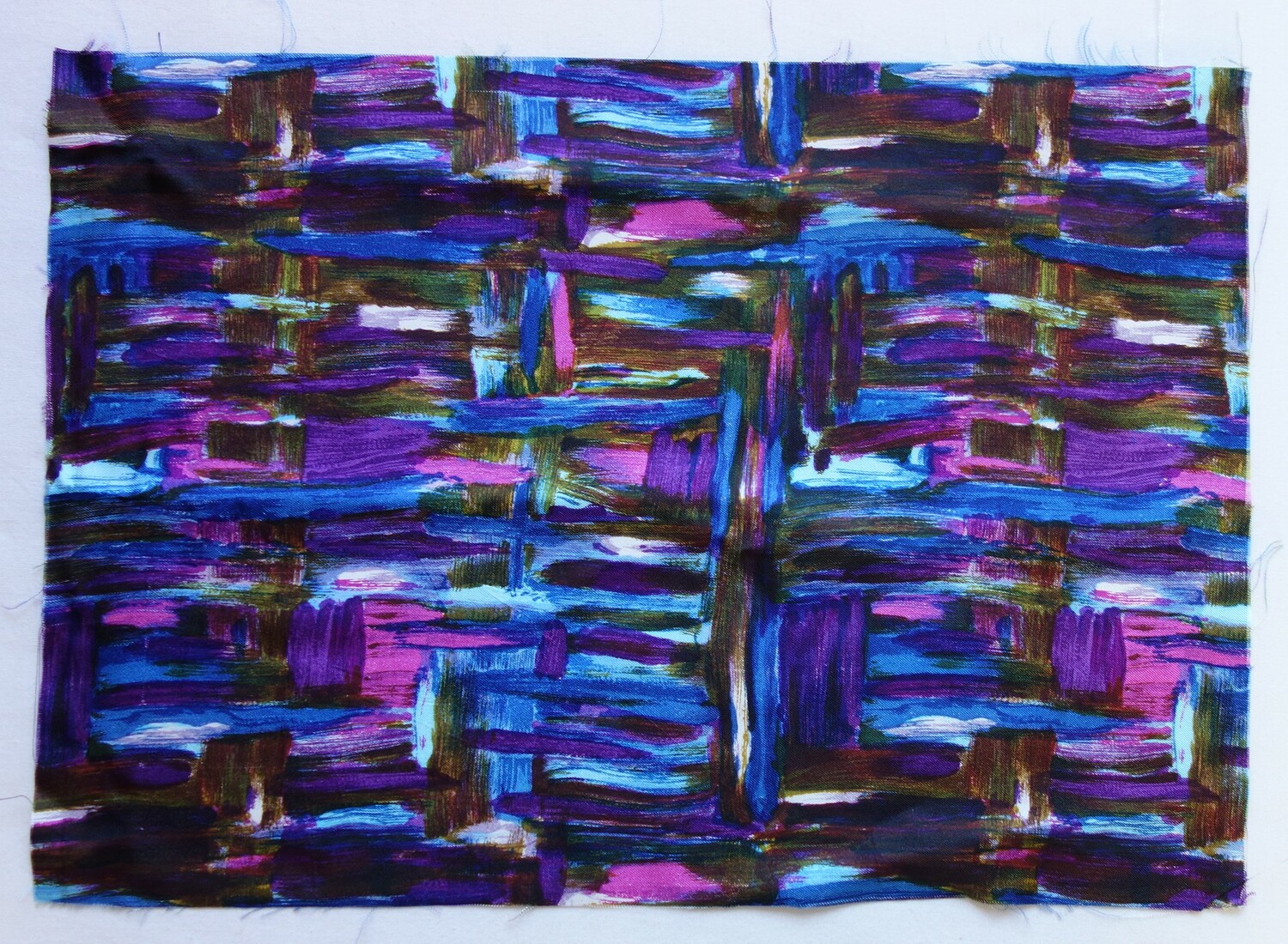 Fig. 2. Cloth sample with an abstract 'painted' design of blobs and thick lines in dark purple, pink, dark blue, mid-blue and light blue, brown and white. Europe, mid-20th century (TRC 2020.1190