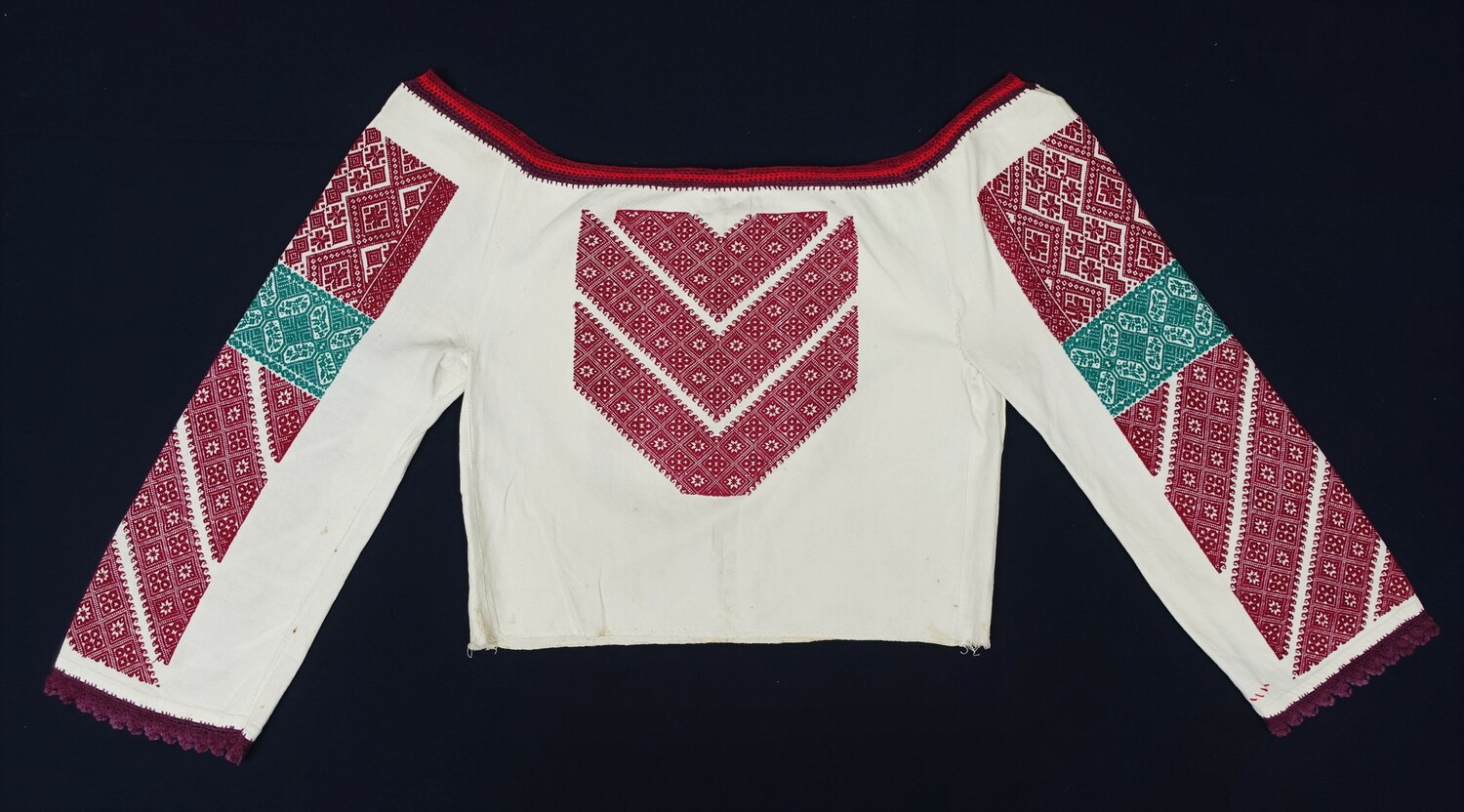 Woman's blouse from the Suceava region, Romania, made from handwoven cloth, and with hand embroidered decoration, 20th century (TRC 2022.0600).
