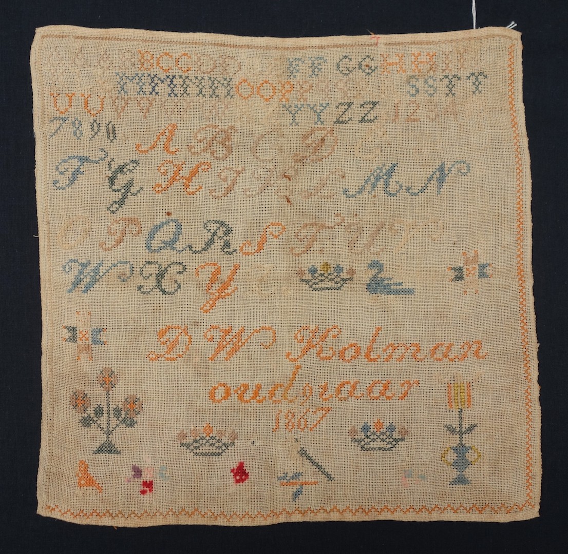 A Dutch sampler worked by D.W. Kolman aged nine, in 1867 (TRC 2023.0185).