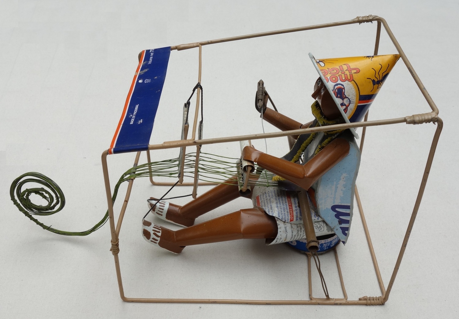 Tin model of a frame loom from Mali, used for the traditional narrow-width bands of cloth (TRC 2023.1212).