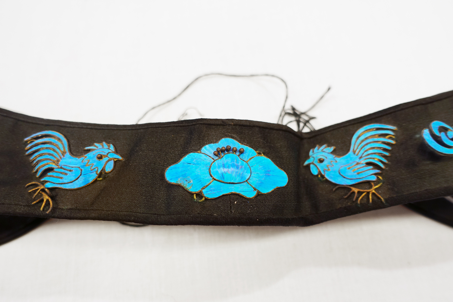 Black satin headband, China, 20th century (TRC 2023.2074).