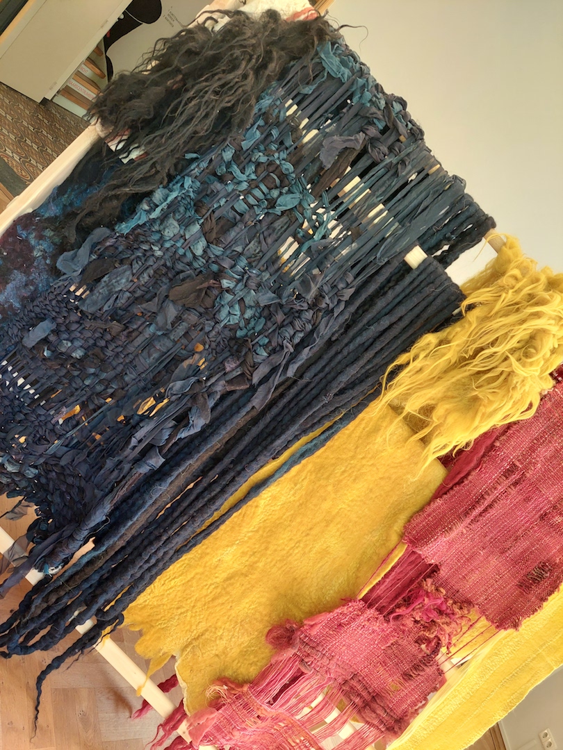 Samples of natural dyed textiles at the exhibition “Guernica de la Ecologia” by Claudy Jongstra. Photograph by Shelley Anderson.