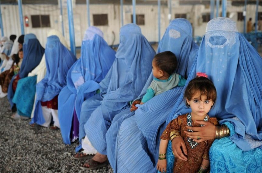 Group of Afghan women wearing their 'blue burqa.' Photograph by A. Majeed, AFP.