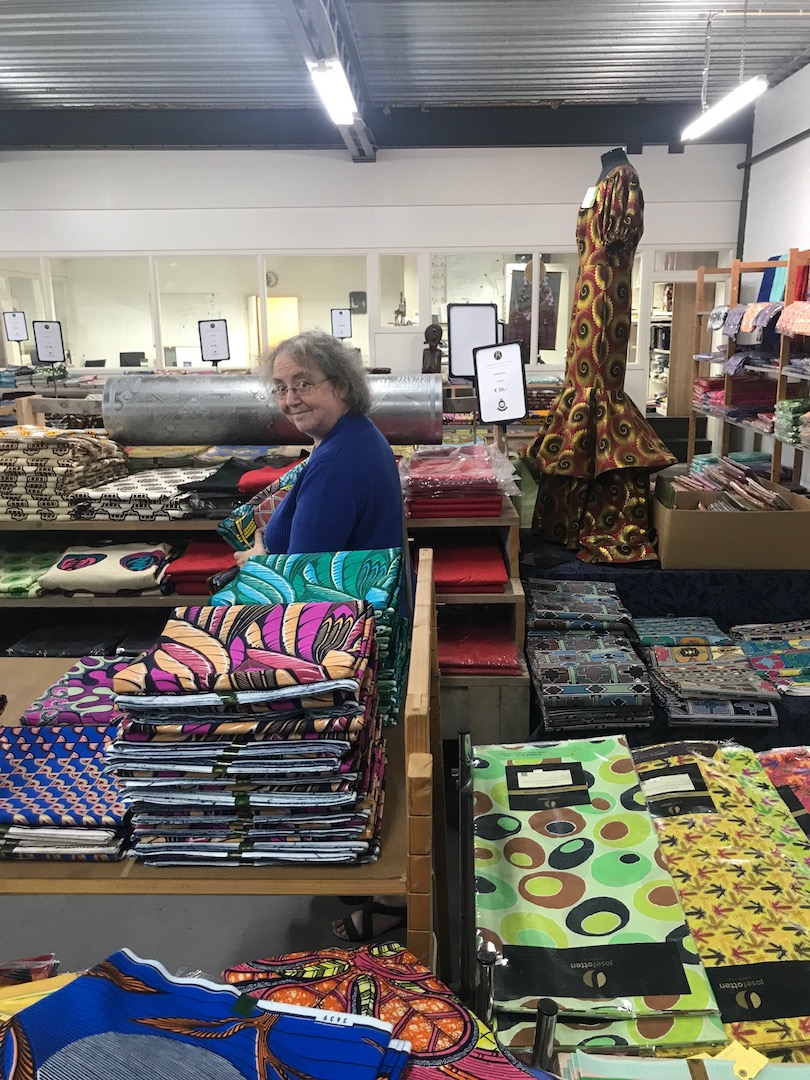 The author in paradise. At the shop/storage of Jansen Holland in Helmond, surrounded by wax prints for the West African market. Saturday 20 August. Photograph: Willem Vogelsang