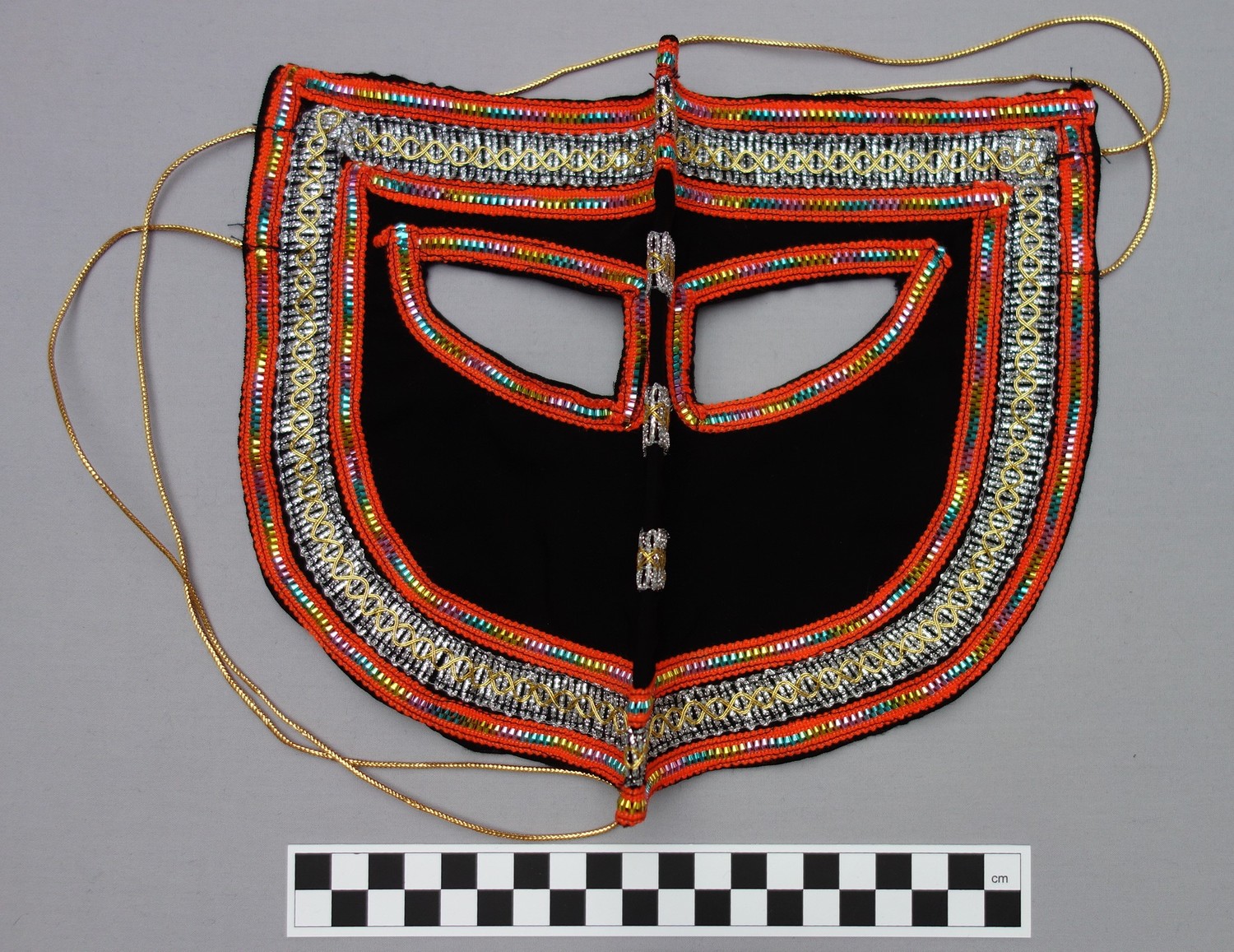 Woman's velvet face covering from Oman, late 20th century (TRC 2005.0226).