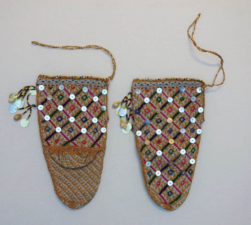 A pair of hand knitted Macedonian bridal socks, late 20th century (TRC 2019.0068a-b).