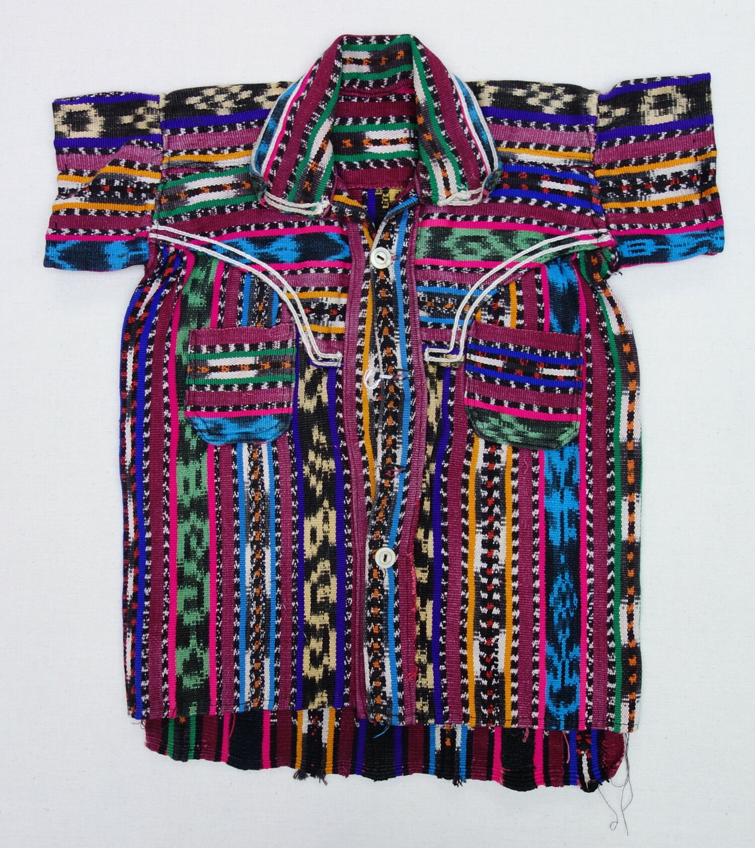 Boy's garment with woven decoration from Guatemala, 1955 (TRC 2020.4573).
