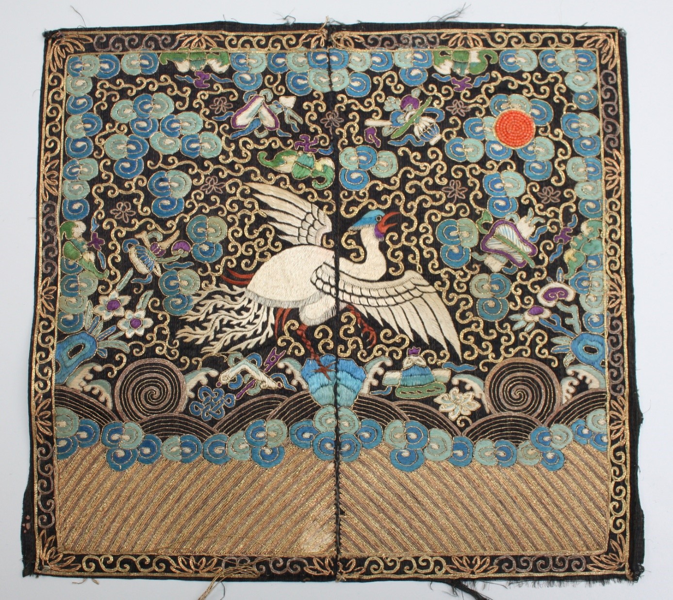 Embroidered rank badge from 19th century China (TRC 2010.0139b).