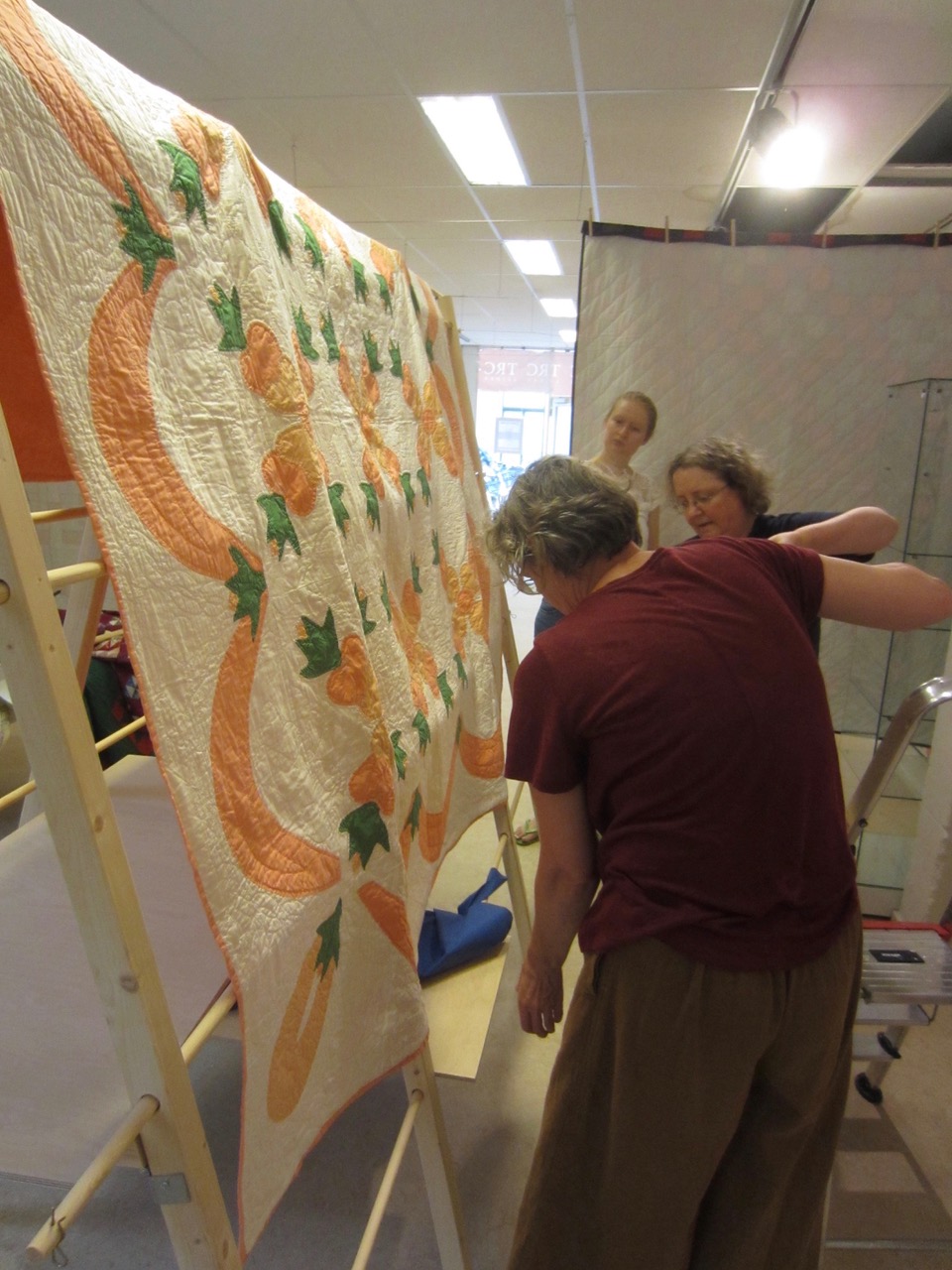 Setting up the quilt exhibition